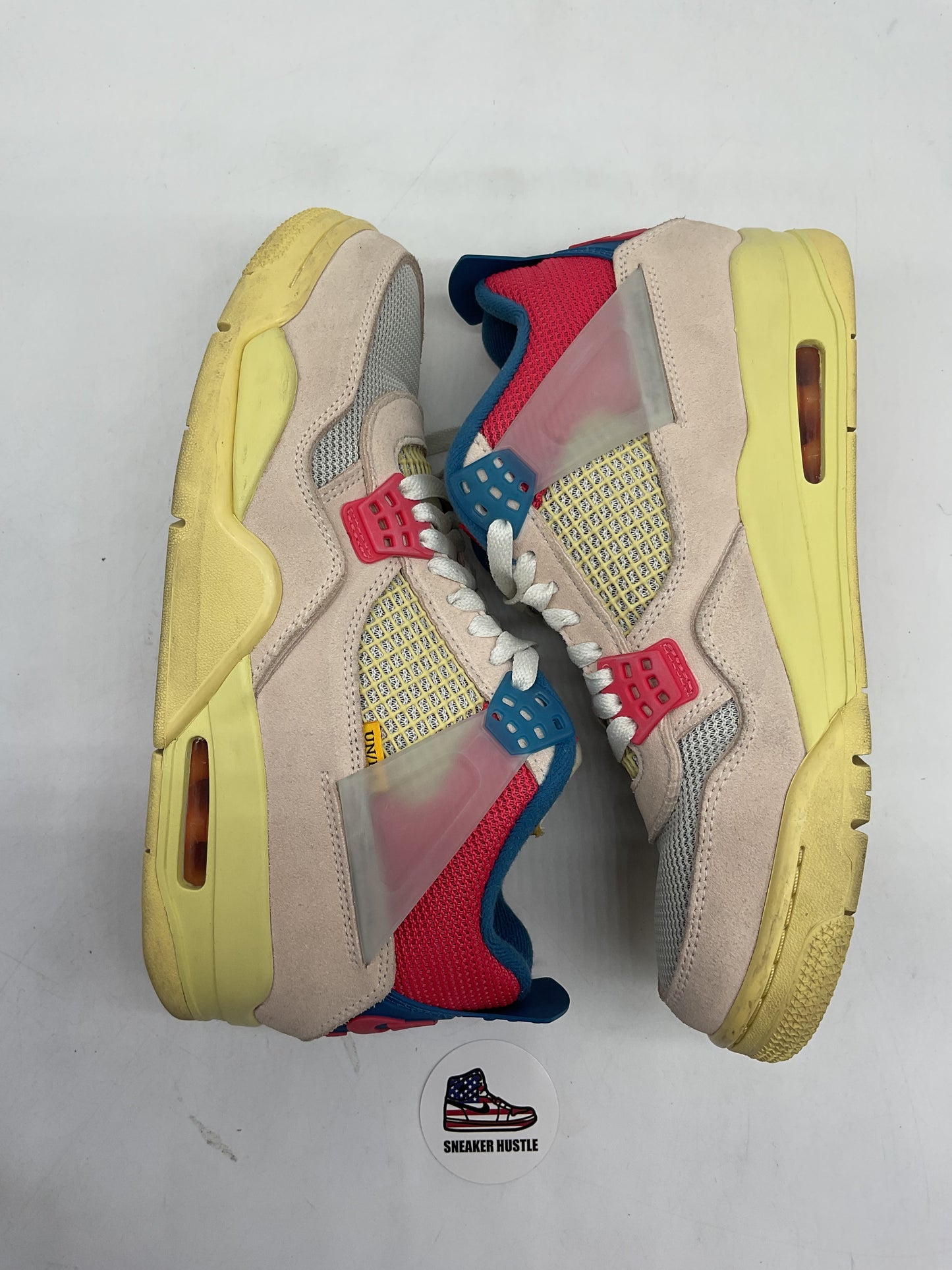 Jordan 4 Retro Union Guava Ice