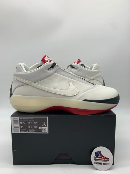 Jordan 40 Chicago white sneaker on black box with red and black sole and Nike swoosh, size 9.5 US