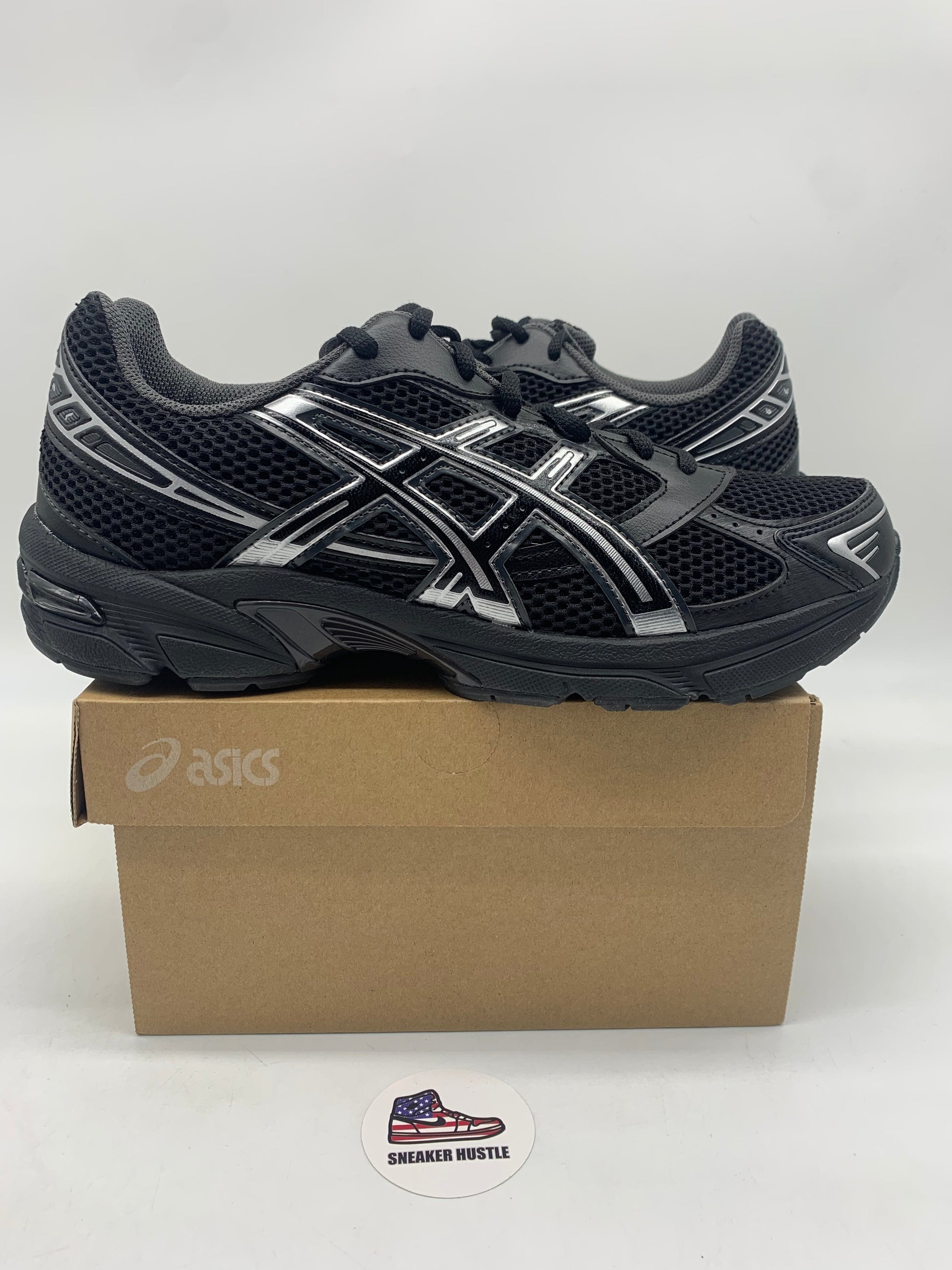 ASICS Gel-1130 black and pure silver running shoe on box