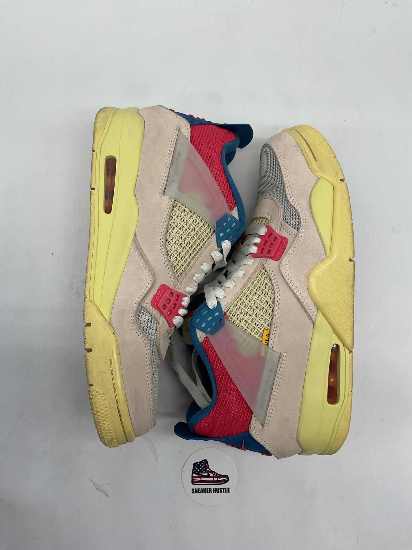 Jordan 4 Retro Union Guava Ice