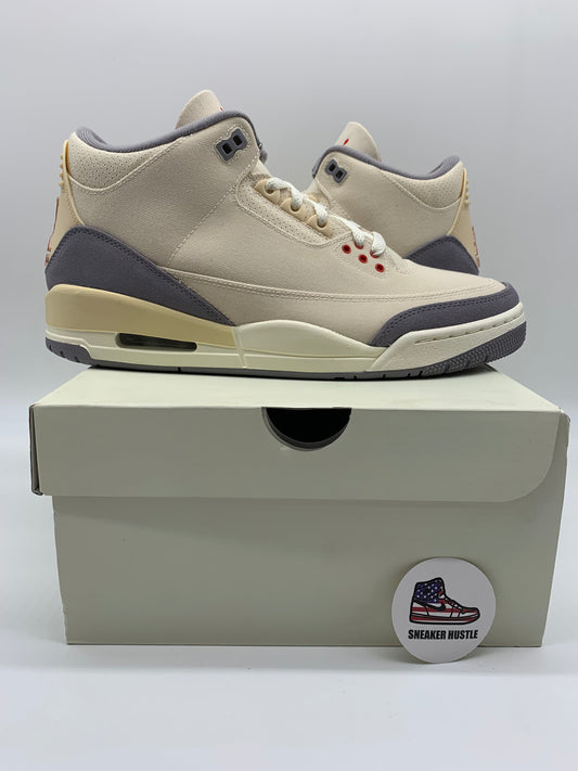 Jordan 3 Retro Muslin sneakers in cream and grey colorway displayed on a shoebox with Sneaker Hustle logo badge